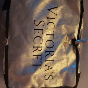 A gold Victoria's Secret bag